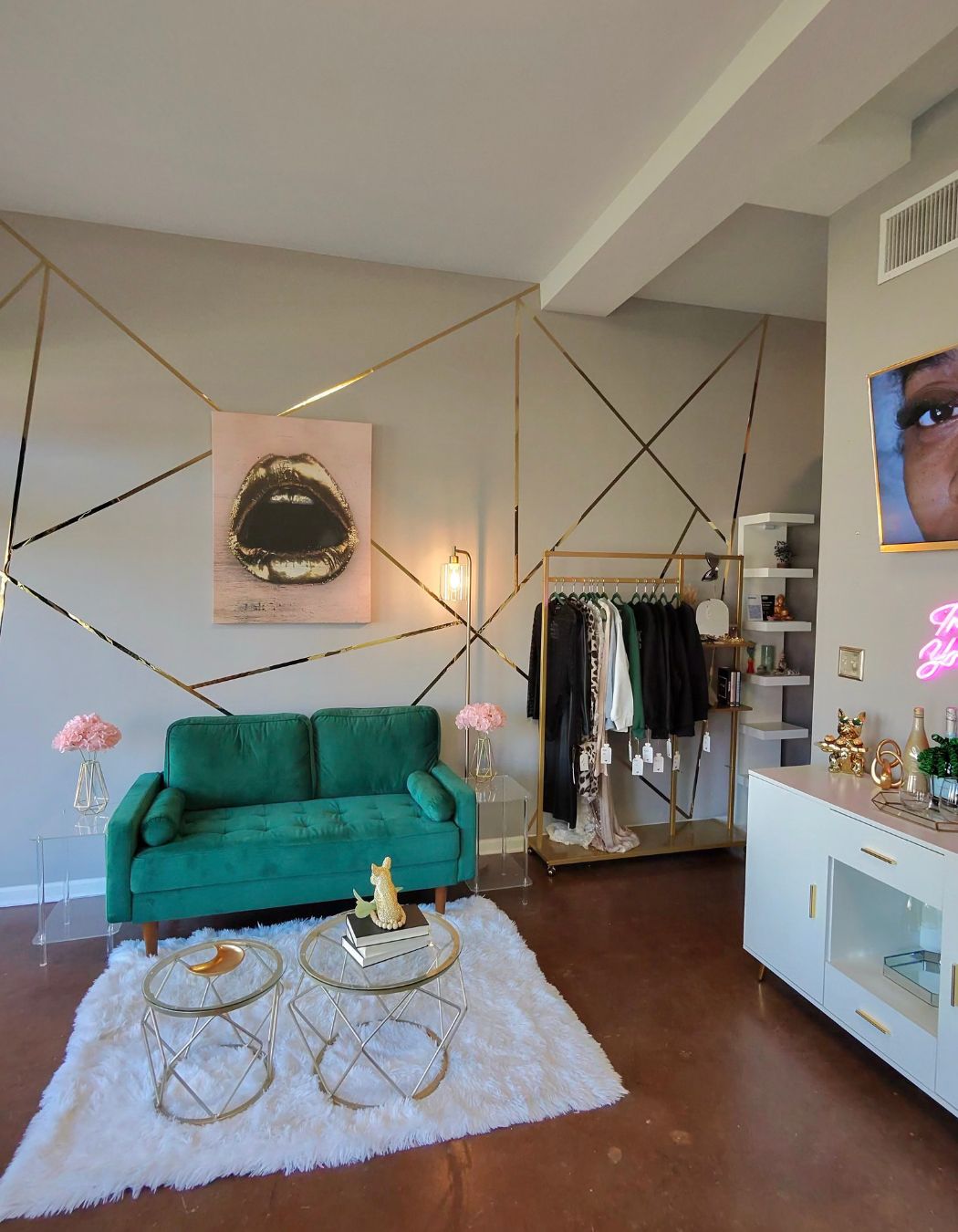 Cozy seating area at a Charlotte spa with modern sofa and welcoming decor.