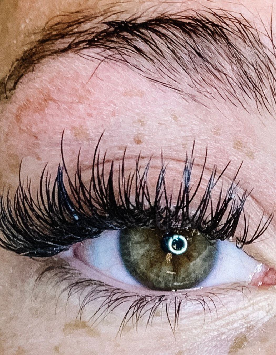 Close-up of a classic lash extension on one eye.