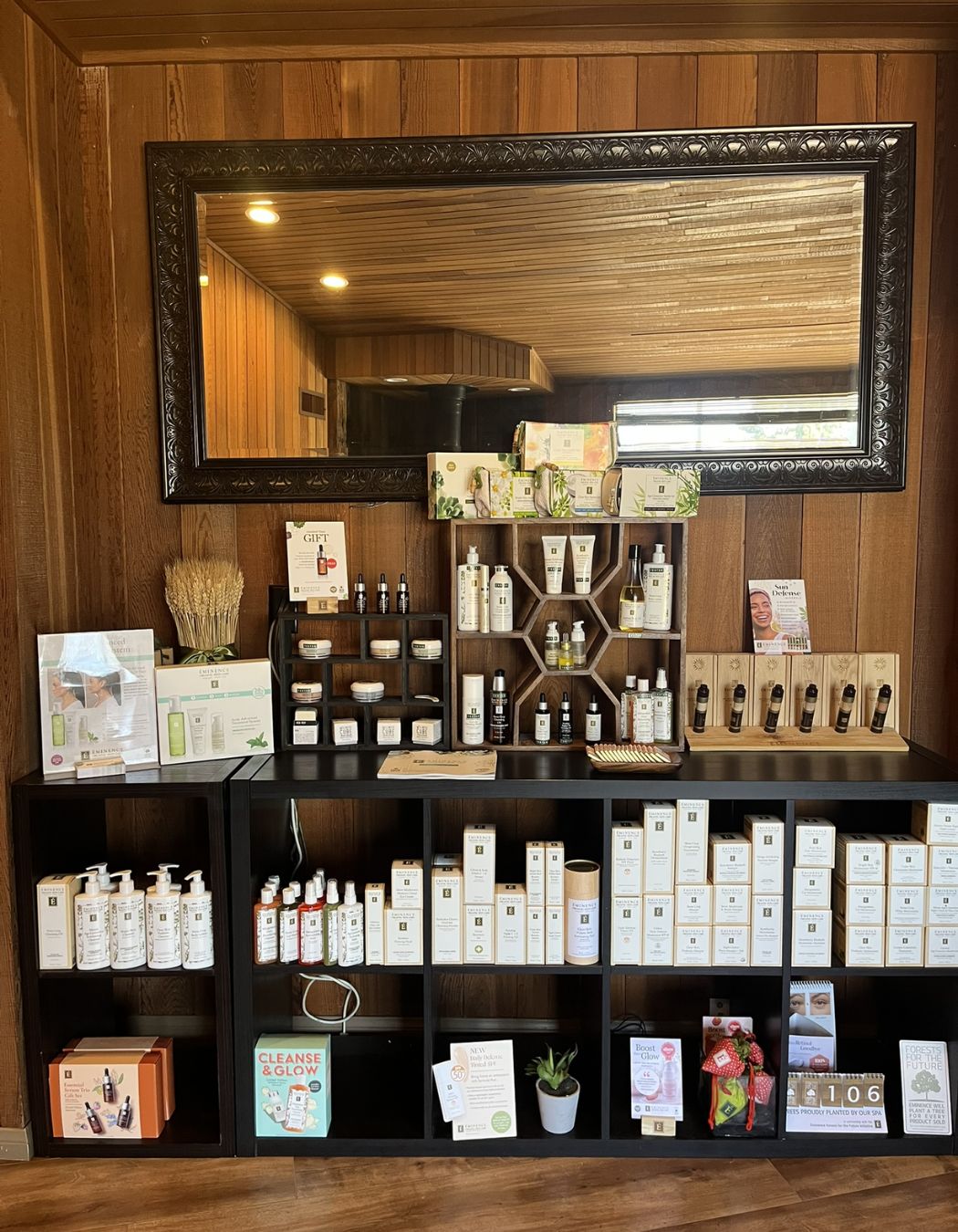 Éminence skincare products arranged neatly on a spa shelf.