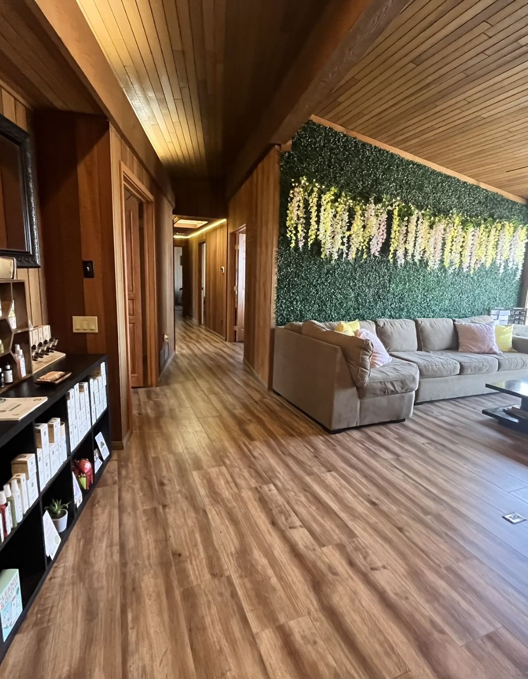 Cozy sofa placed in the waiting area of Revive Day Spa.